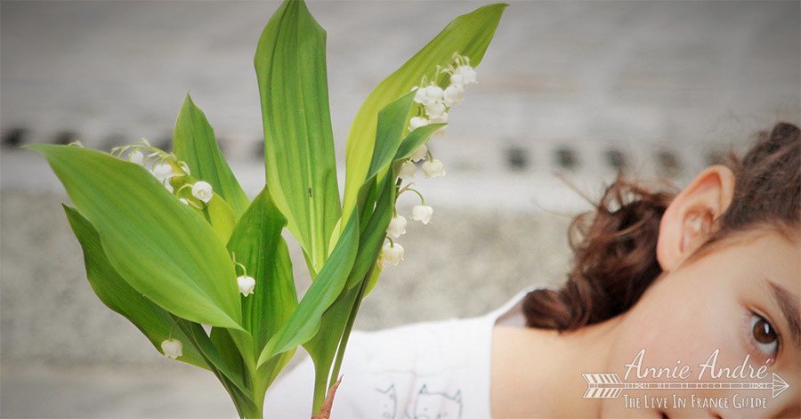 The tradition of giving the LIly flower Muguet in France on May Day The tradition of giving the LIly flower Muguet in France on May Day