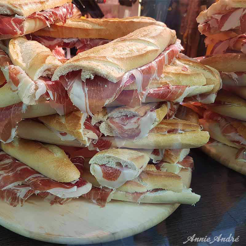 Sandwichs with various types of charcuterie are always available a popular Christmas market food in France Sandwhichs with various types of charcuterie