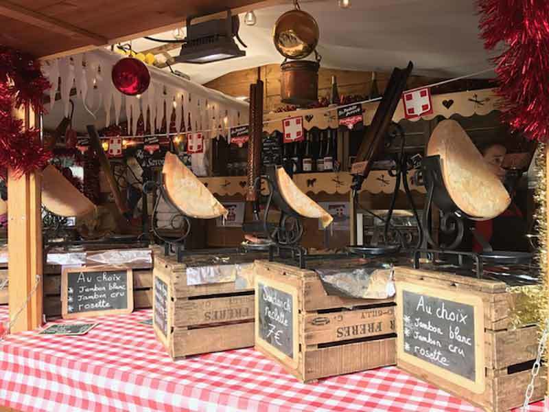 Raclette is a popular food item all year round, not just Christmas markets Raclette chalet at Annecy Christmas Market